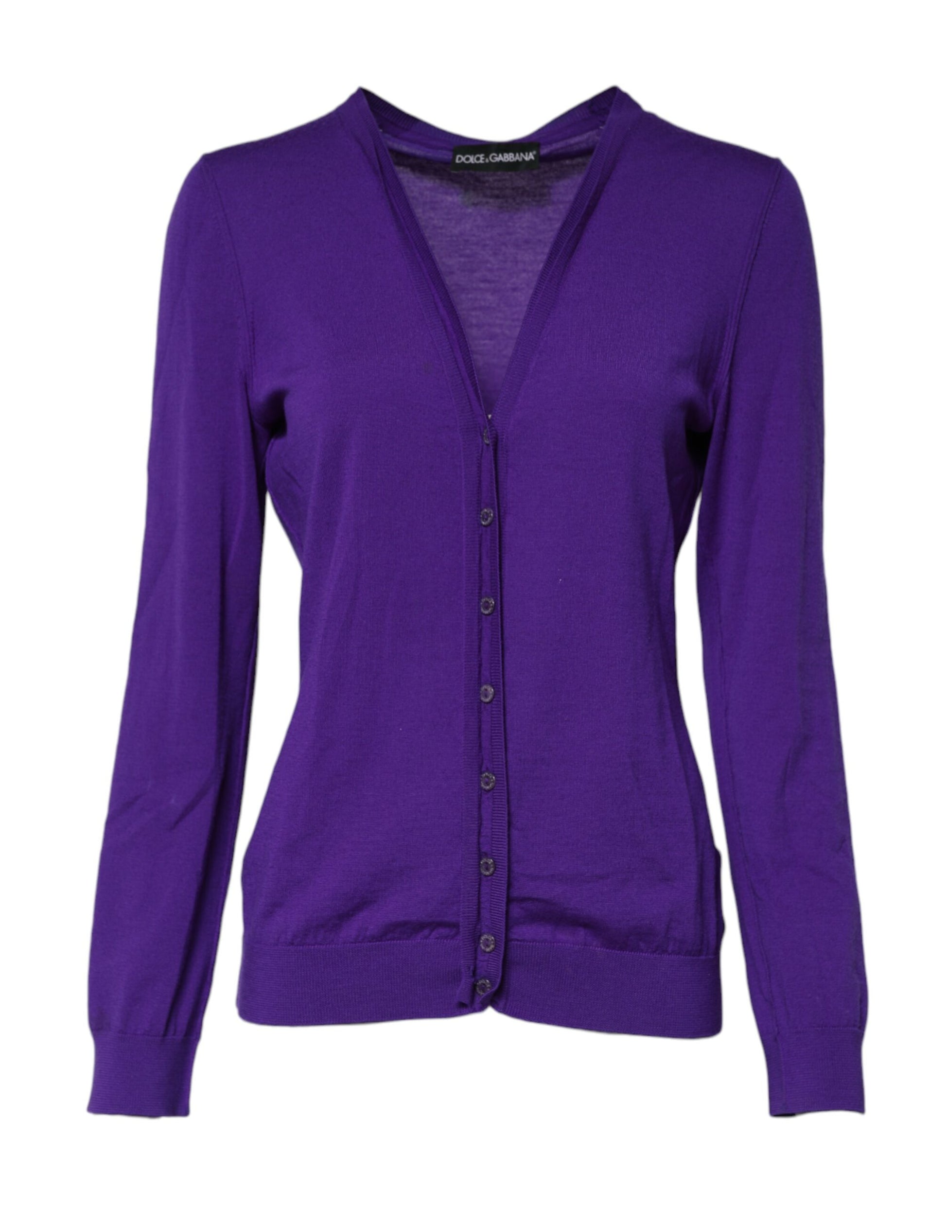 Purple cardigan on hanger