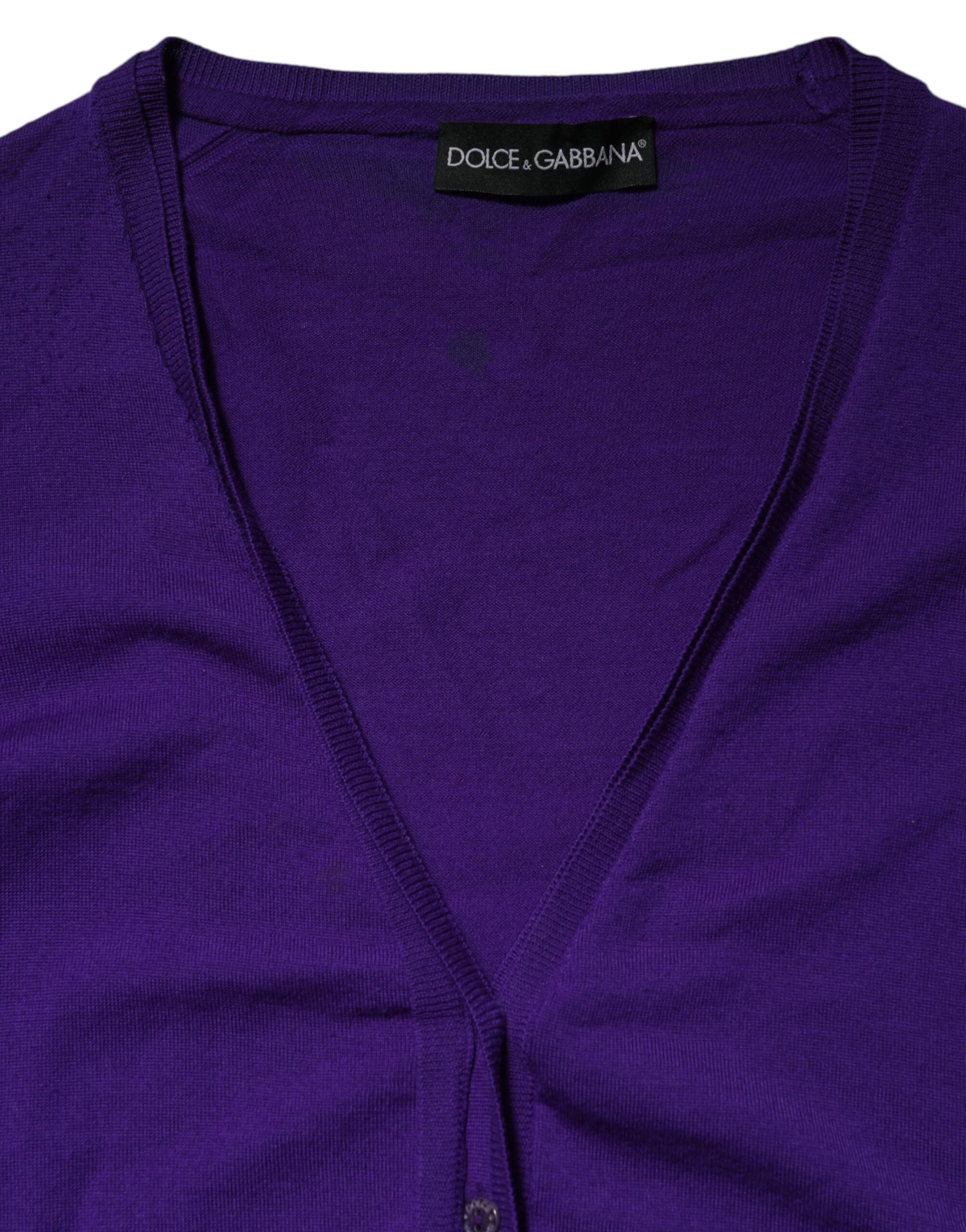 Purple sweater vest on hanger