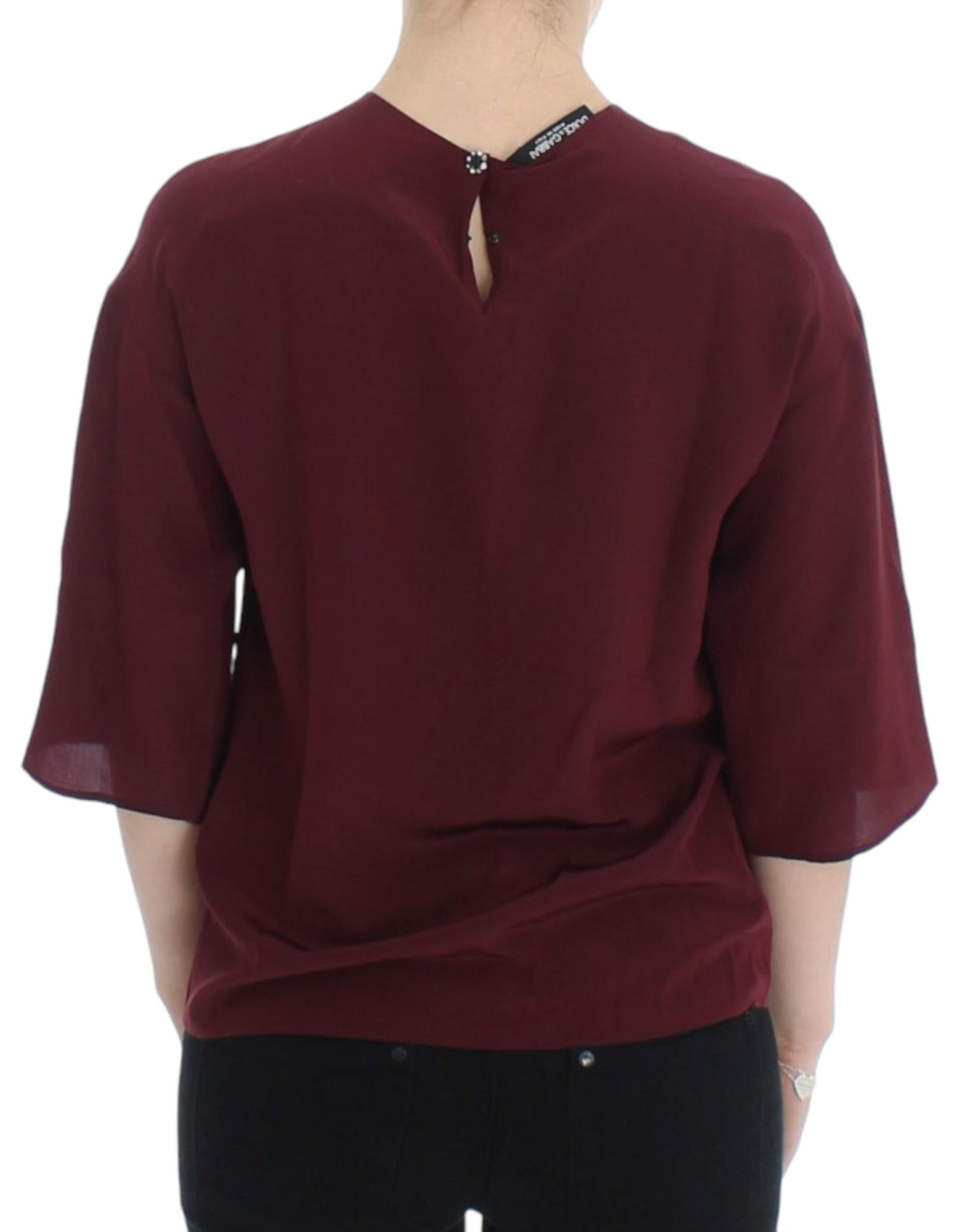 Woman's maroon shirt with a V-neckline