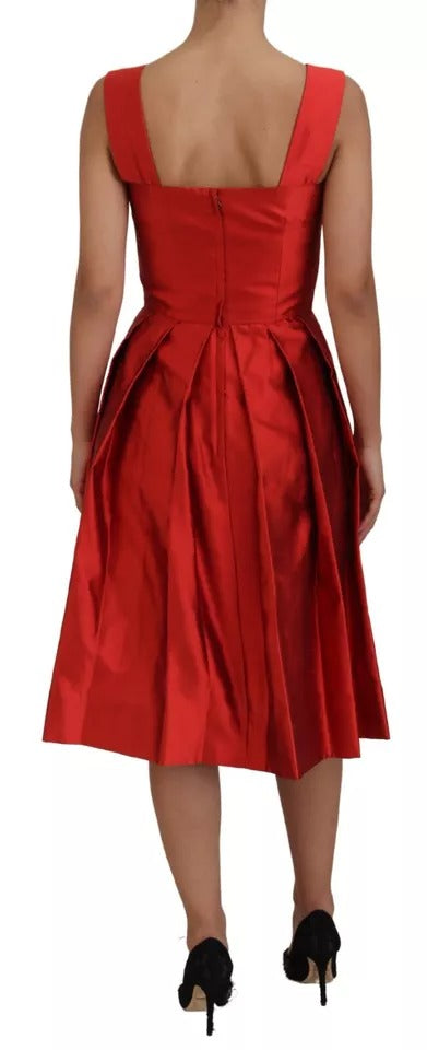 A red midi dress with pleats and satin silk material