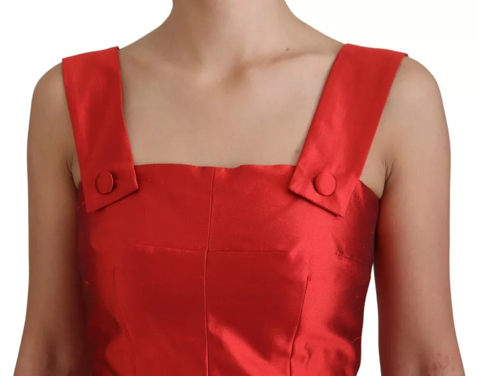 A red satin silk midi dress with pleats and buttons. It is an A-line style from the brand Dolce & Gabbana