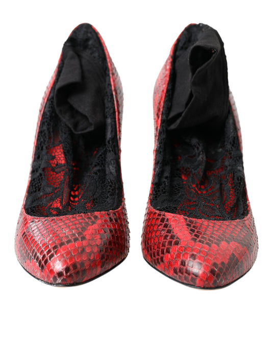 Pair of red high heel shoes with black lace and snake skin texture on soles