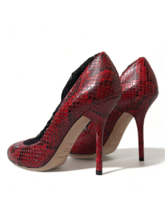 Red high heel shoes with a snake skin texture and tan soles