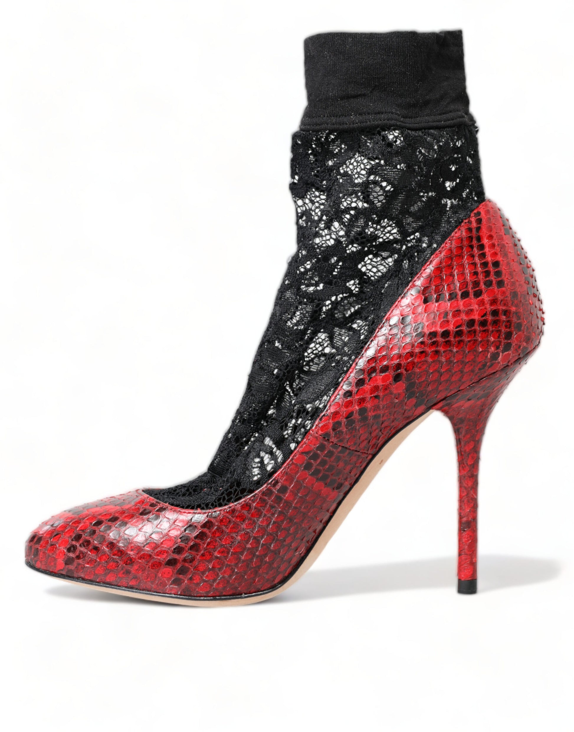 Red high heel shoes with black lace and a patterned sock