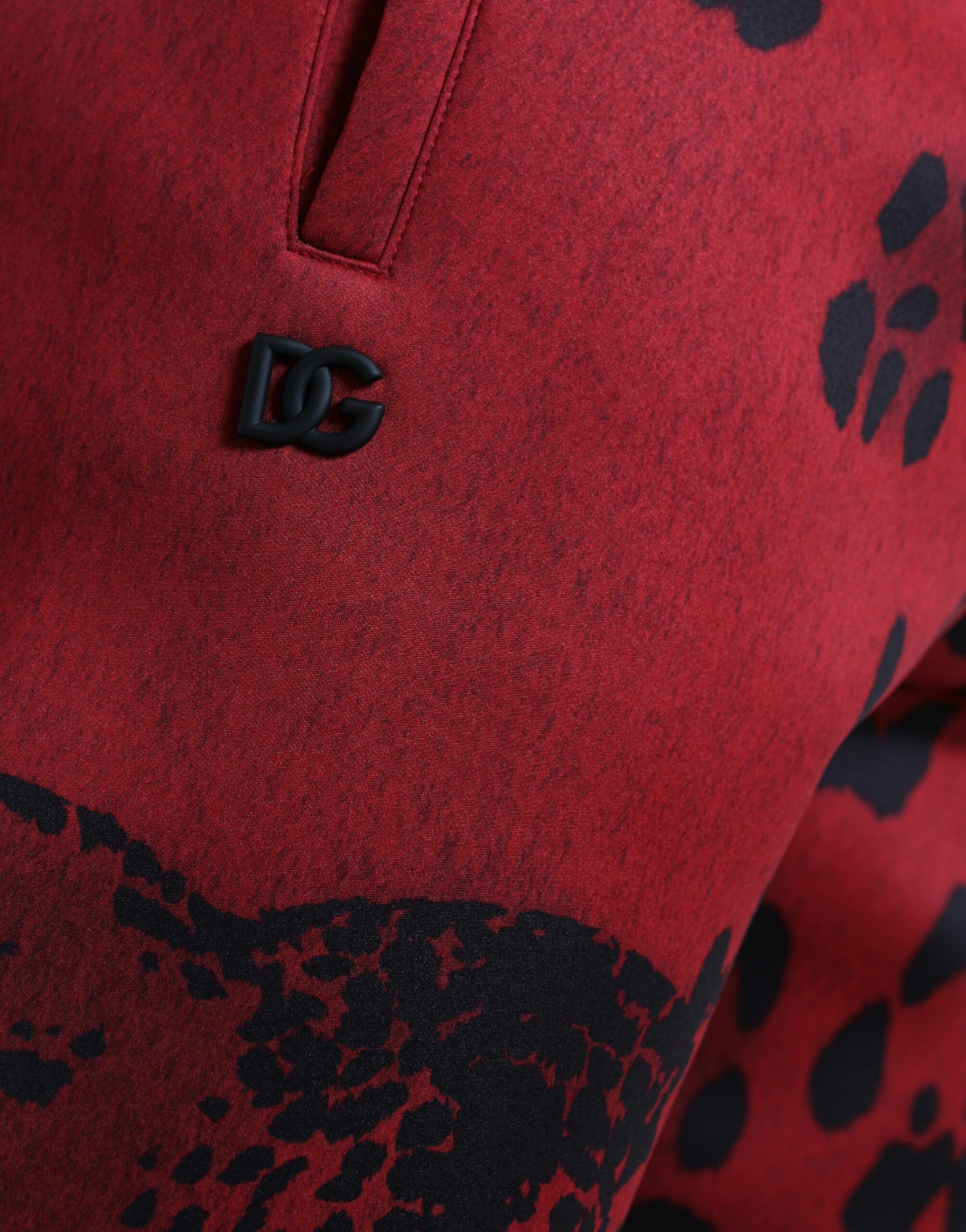 Red jacket with black logo on sleeve