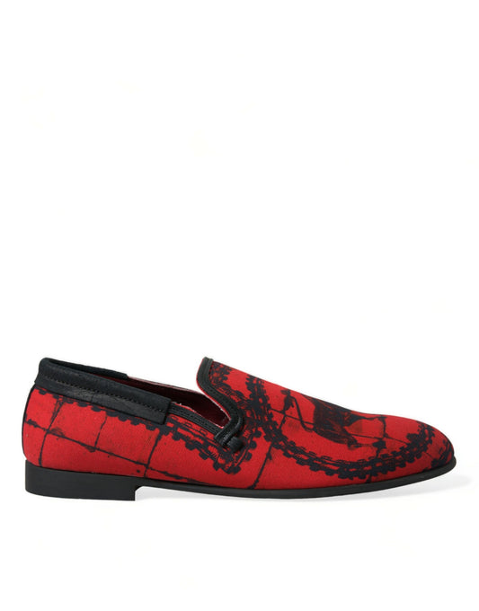 Red loafer shoes with black soles and laces