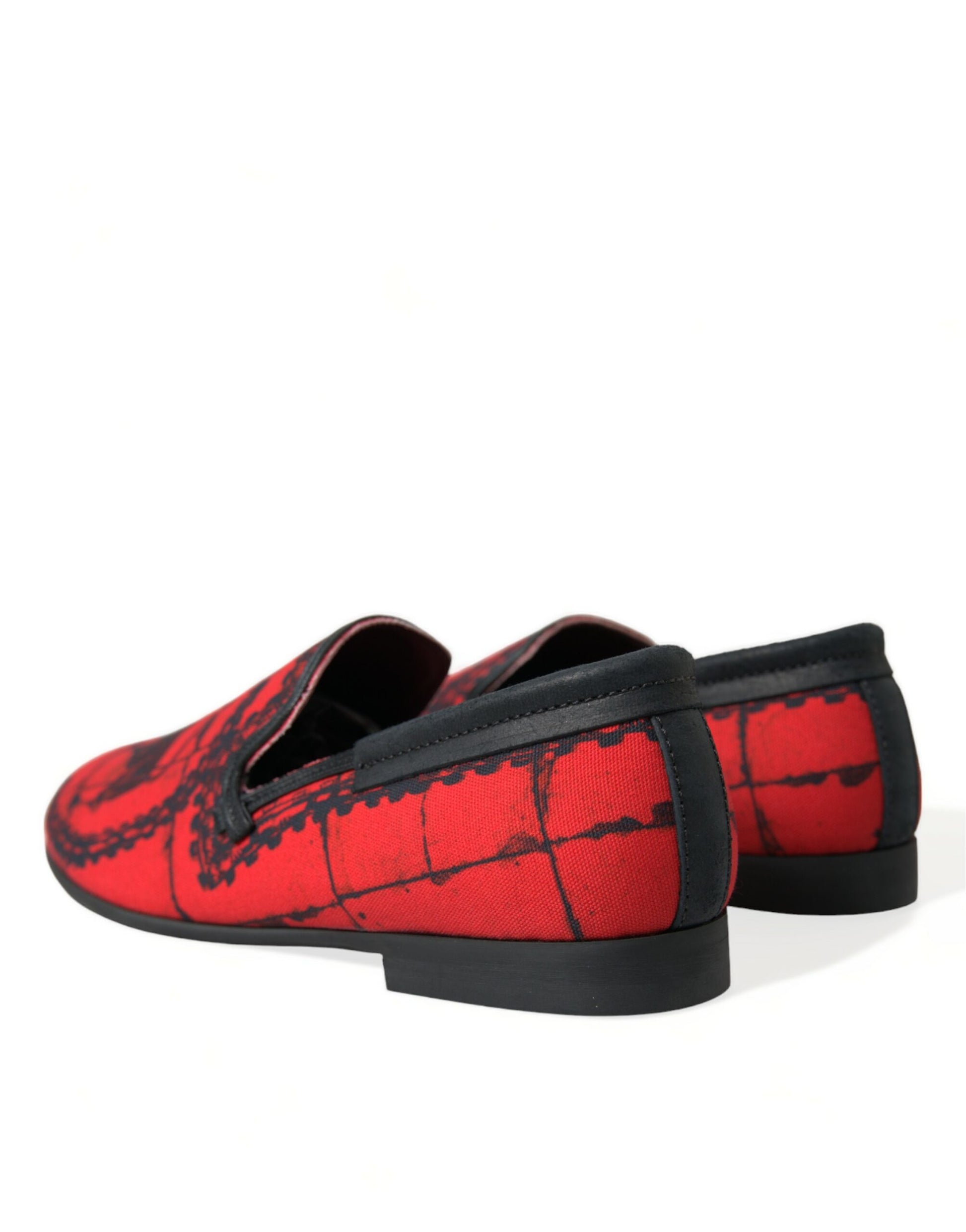 Pair of red and black loafers with embroidered design