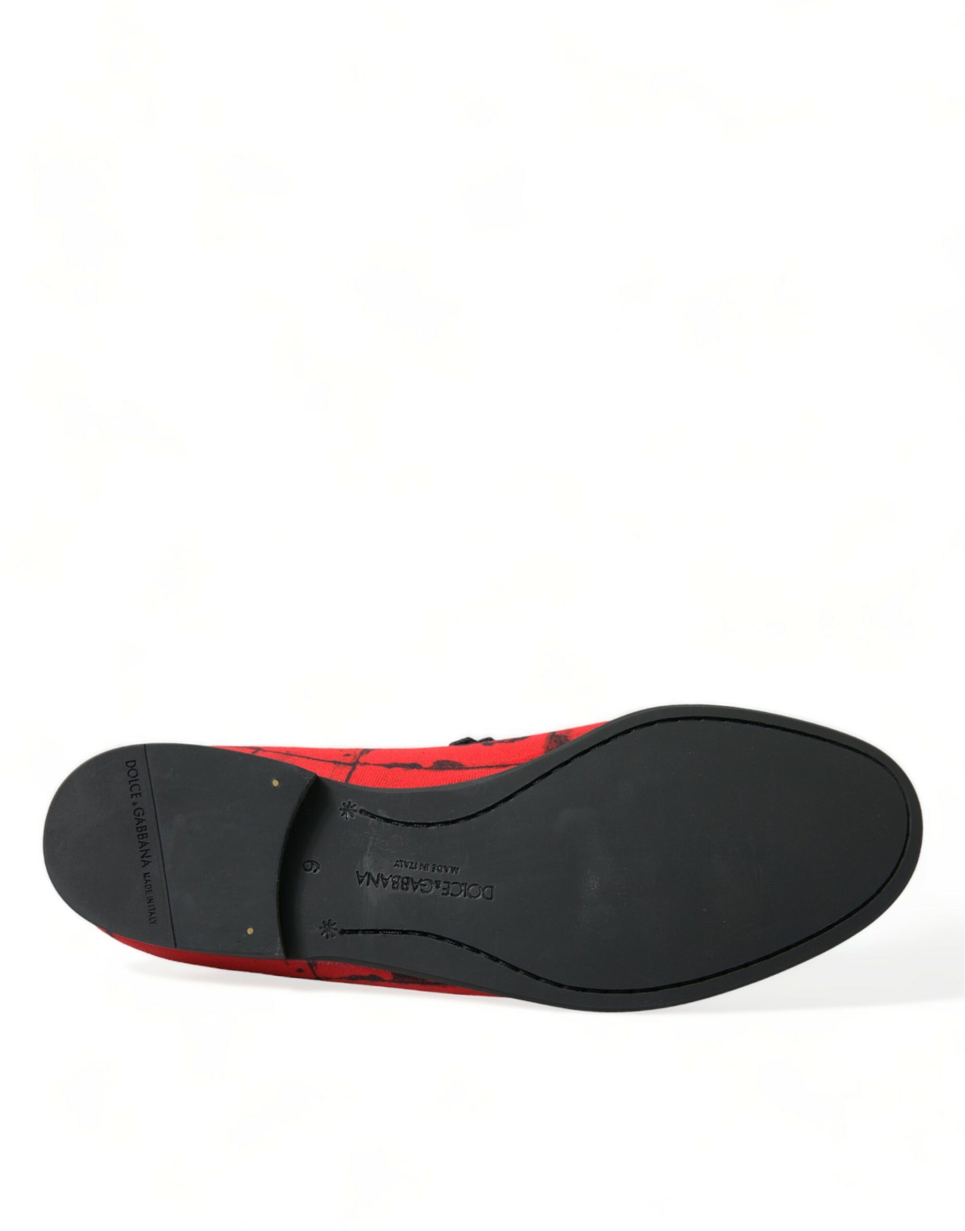 Black and red shoe with white sole