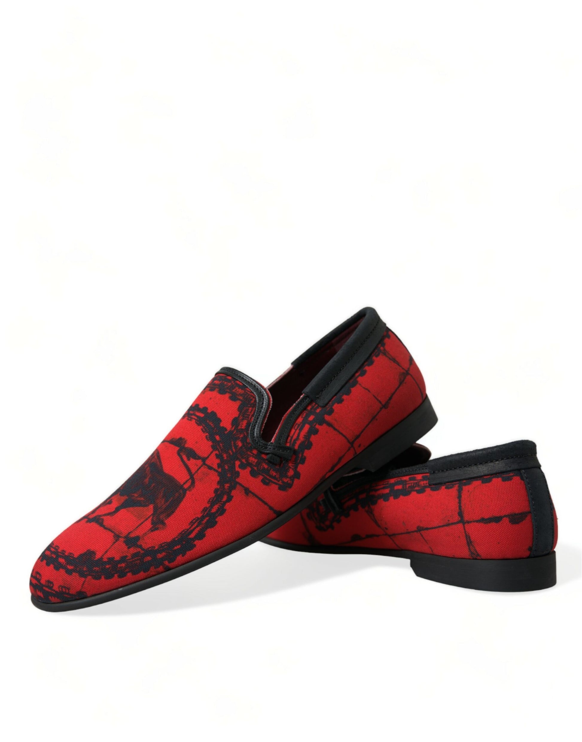 Red loafers with black soles and laces