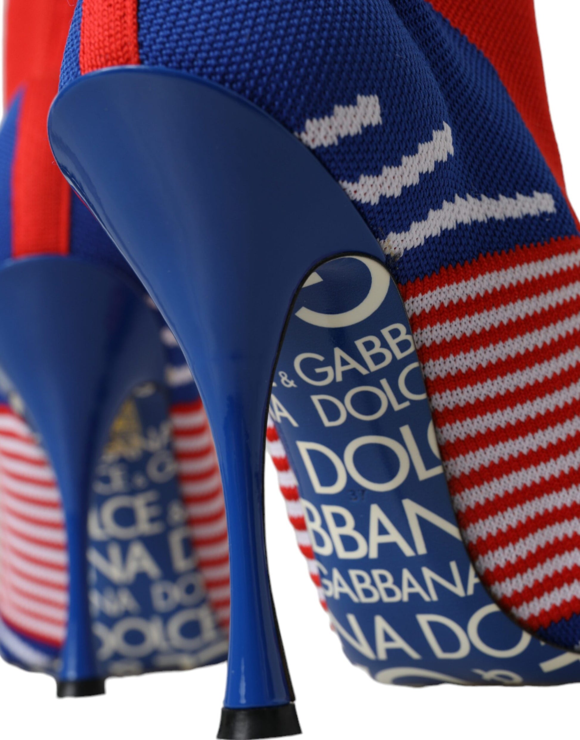 Blue high heel shoe with red white and blue flag design on toe