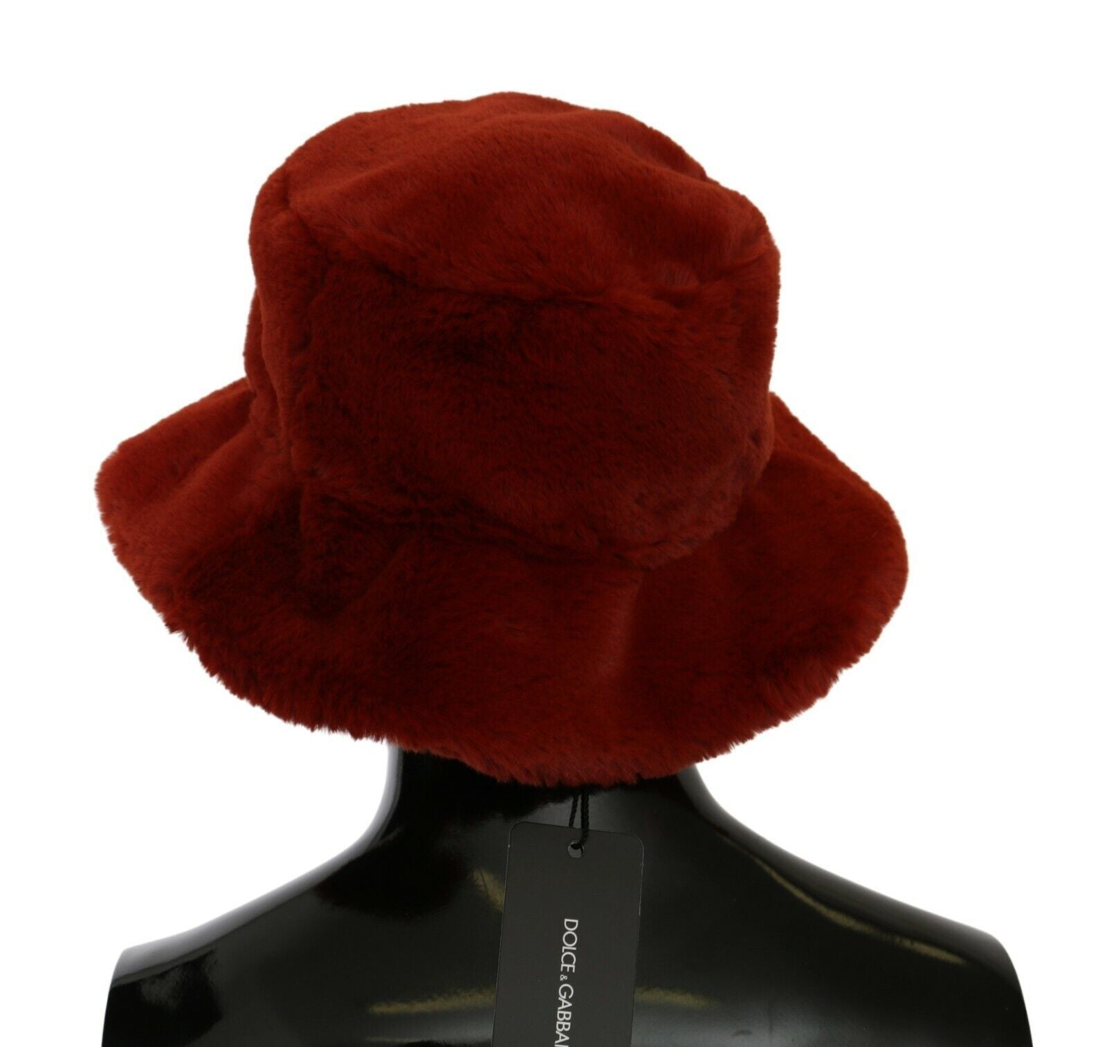 Red furry hat on mannequin head