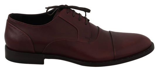 Pair of men's dress shoes with laces and a small heel