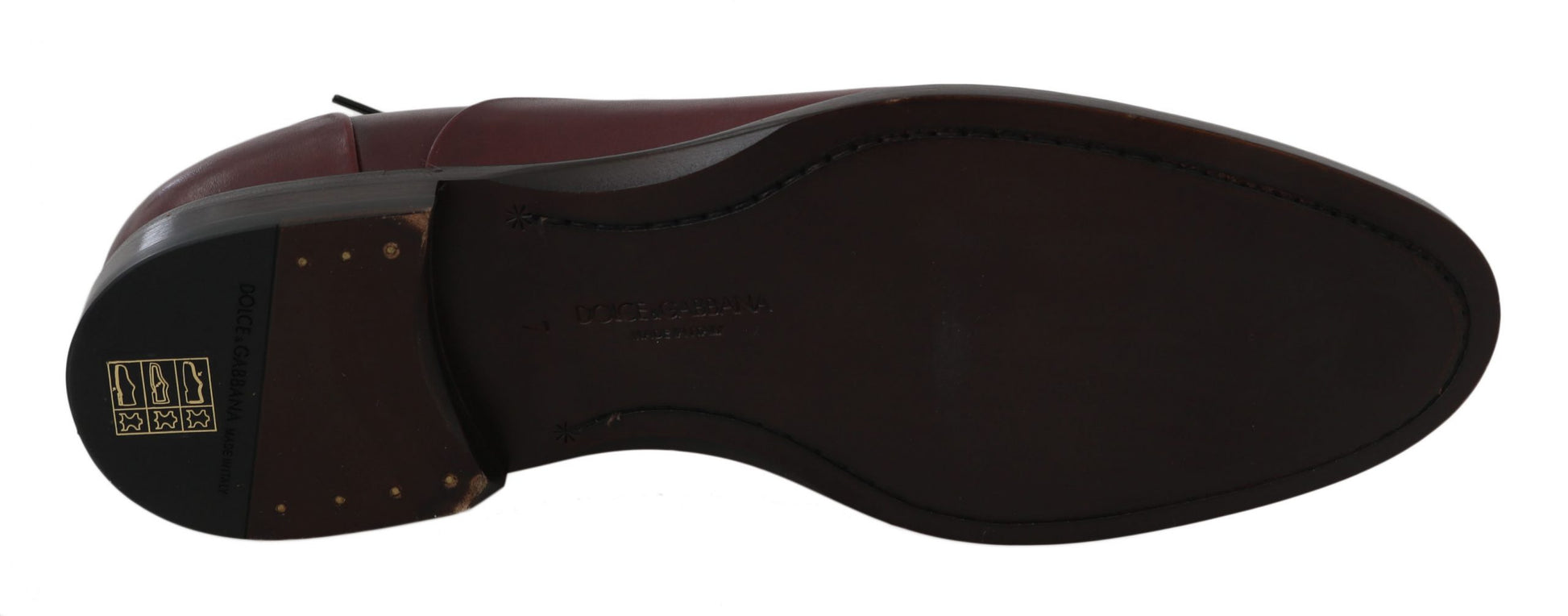 Brown leather shoe with gold buckle and logo on side