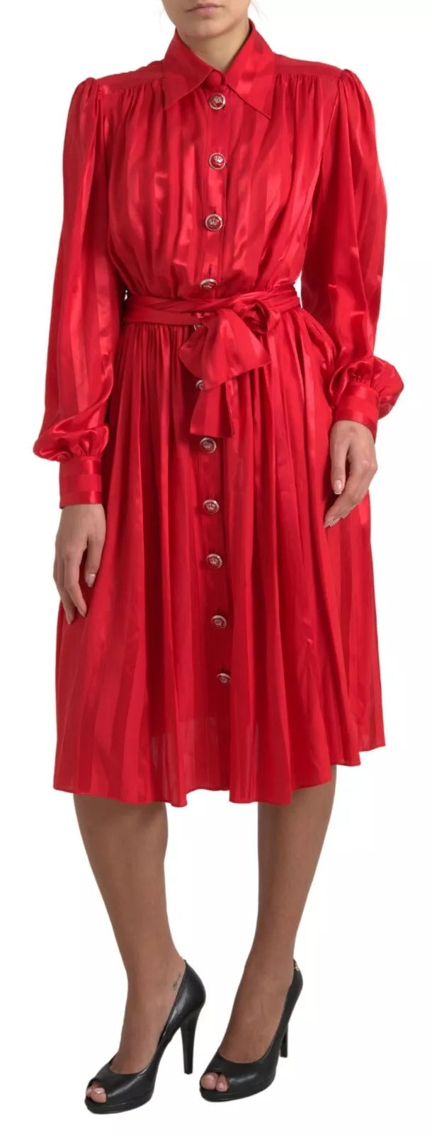 A red midi dress with a belt and buttons, made of satin silk