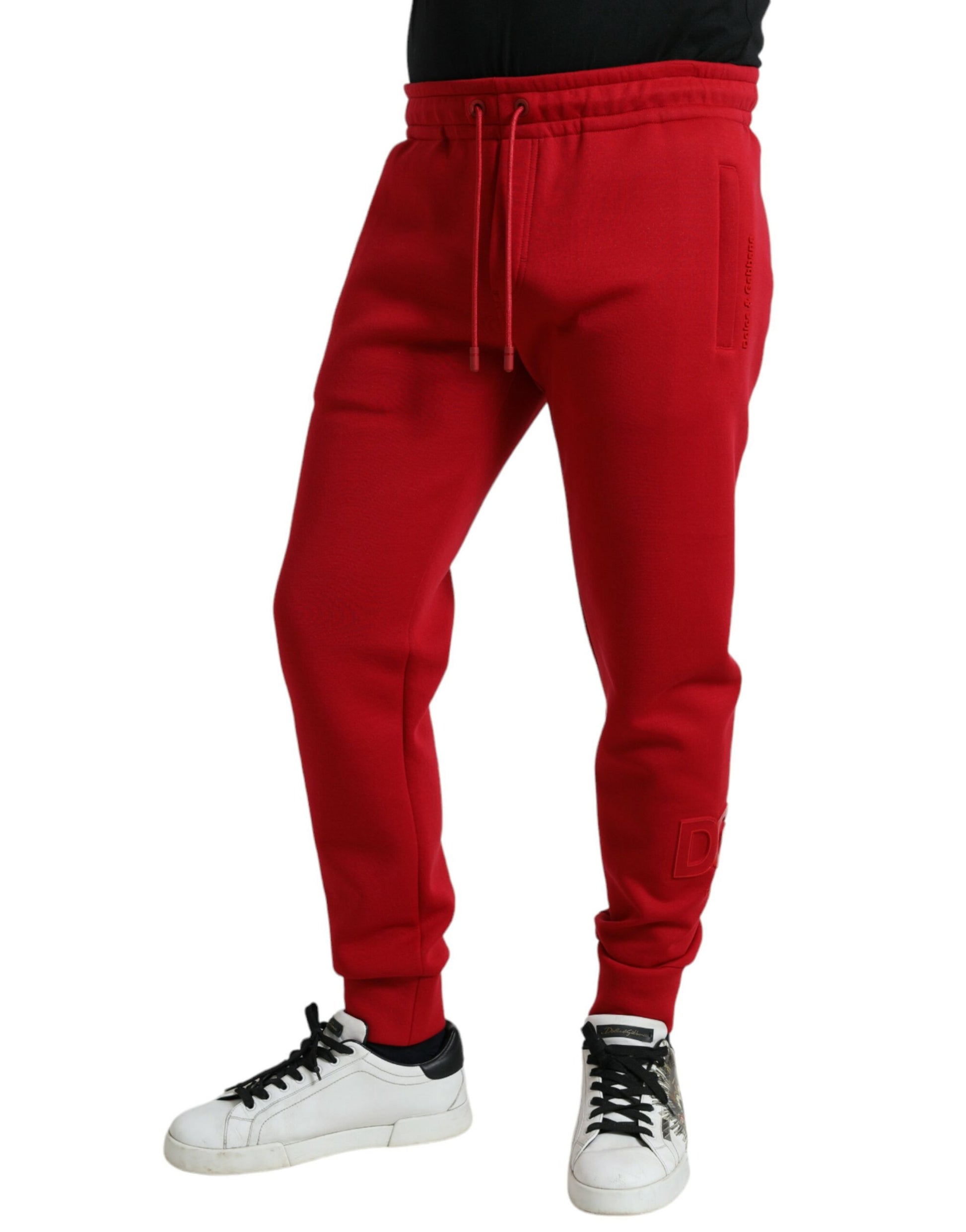 Red sweatpants on a person