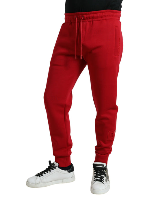 Red sweatpants on a person