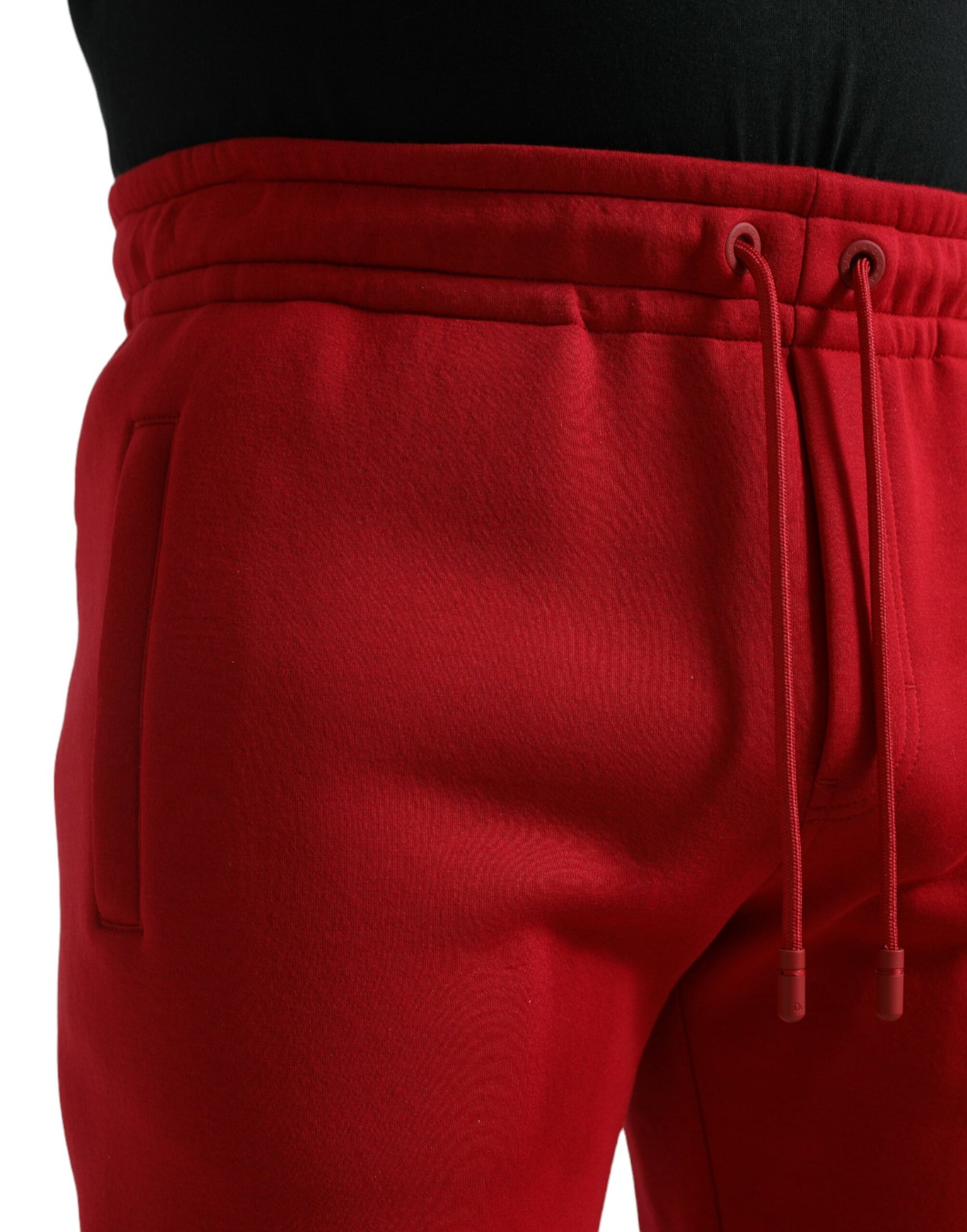 Red sweatpants with drawstring waistband