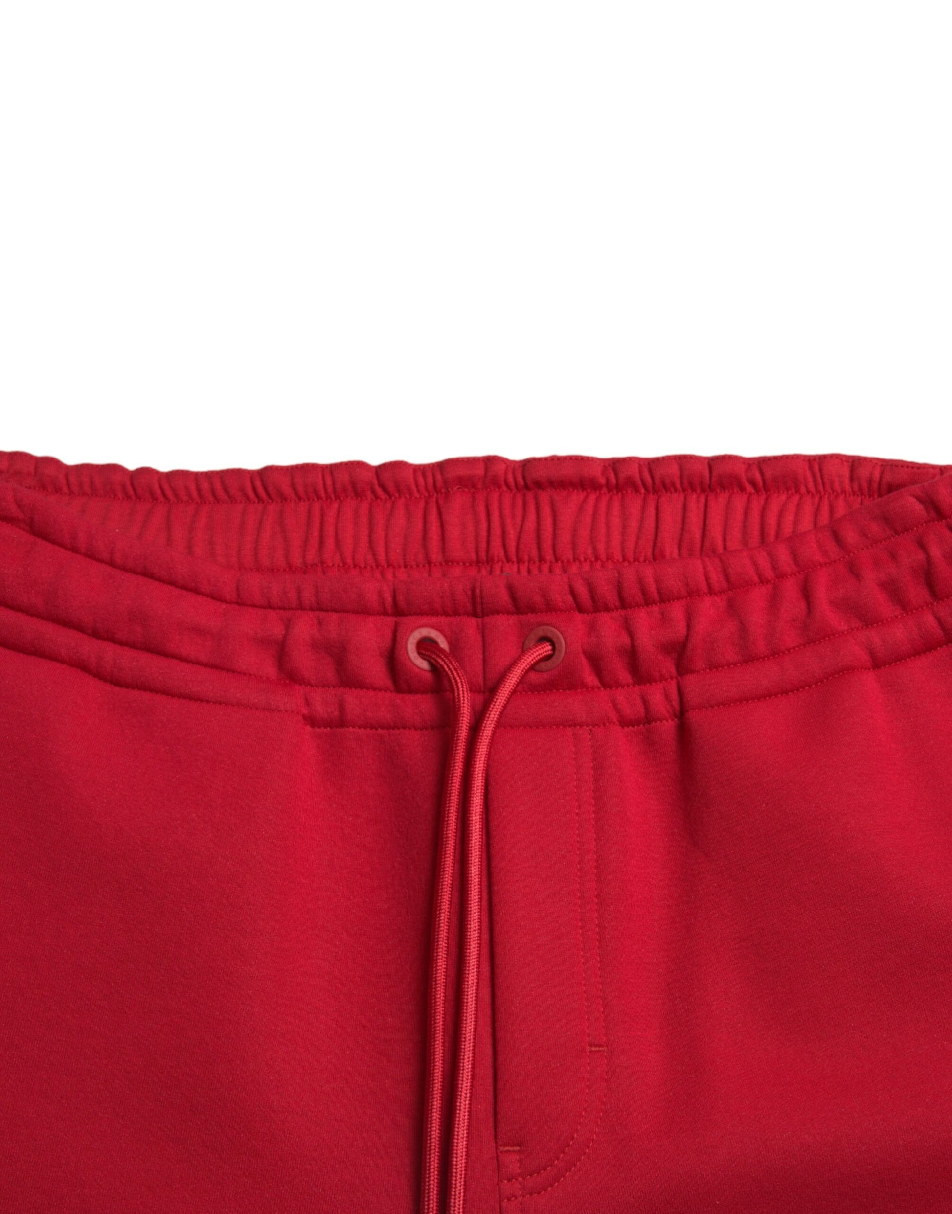 Red athletic shorts with drawstring waistband