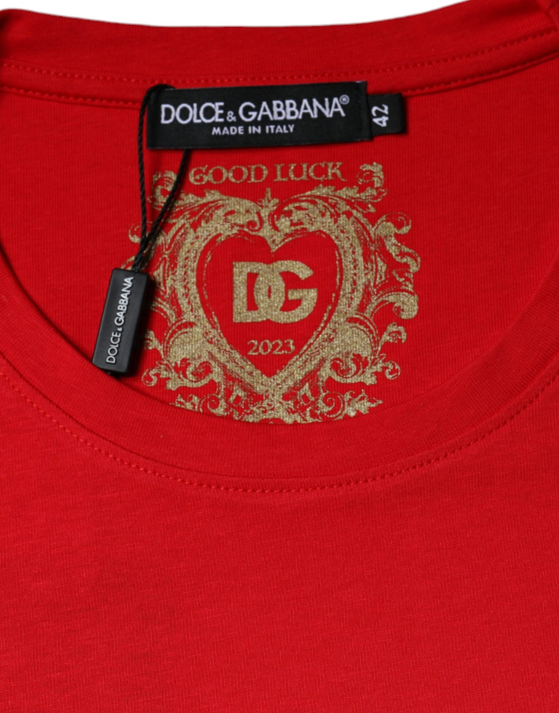 Red shirt with heart logo on front