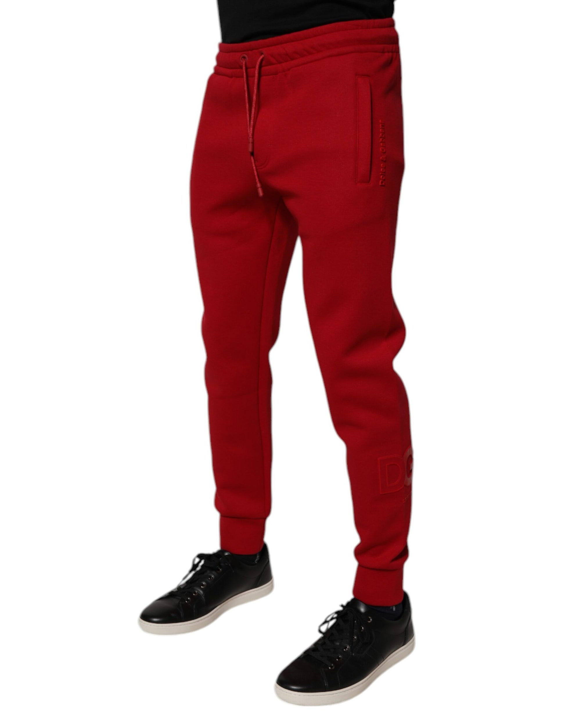 Red sweatpants with pockets on legs