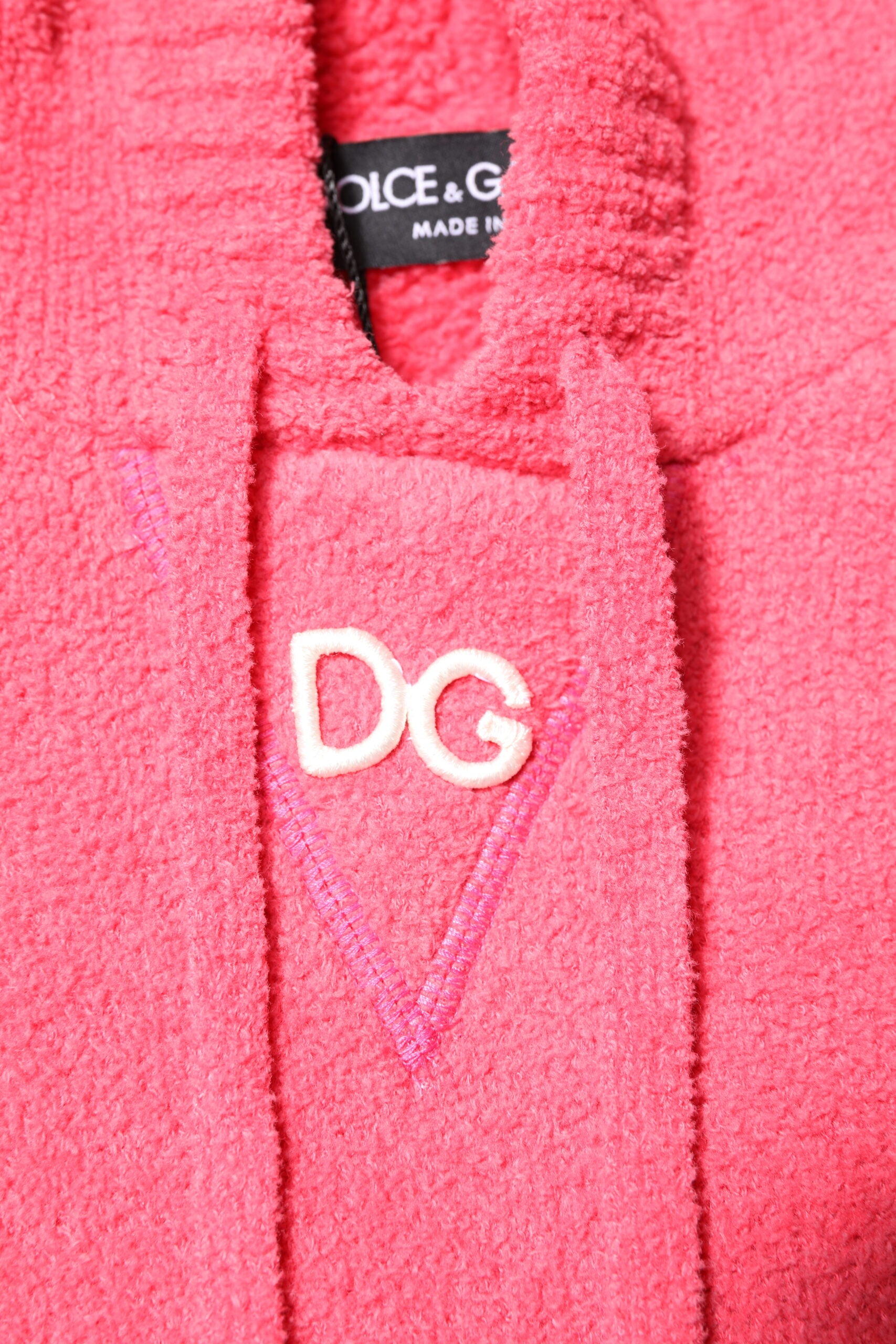 Pink towel with embroidered initials
