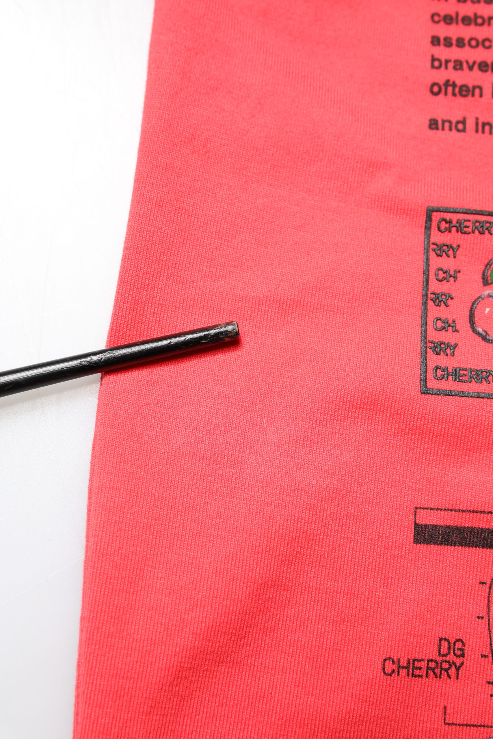 Red fabric with white label