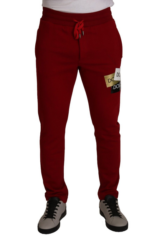 Red sweatpants with white logo on leg