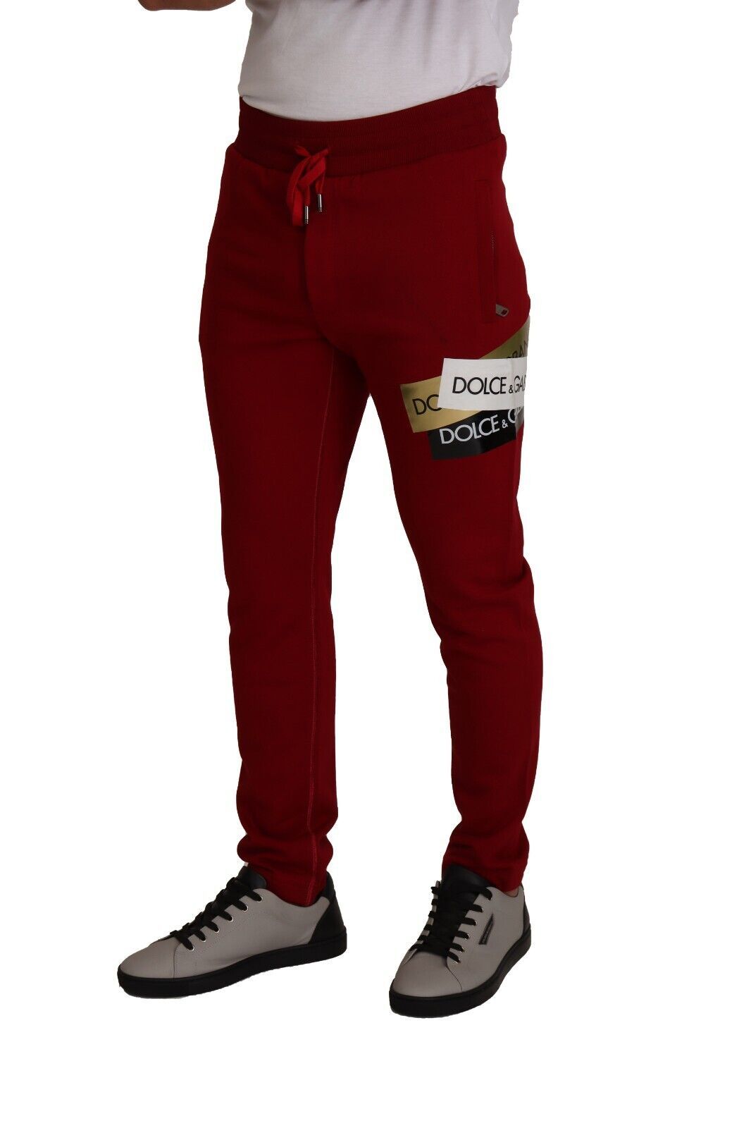 Red sweatpants with white logo on leg