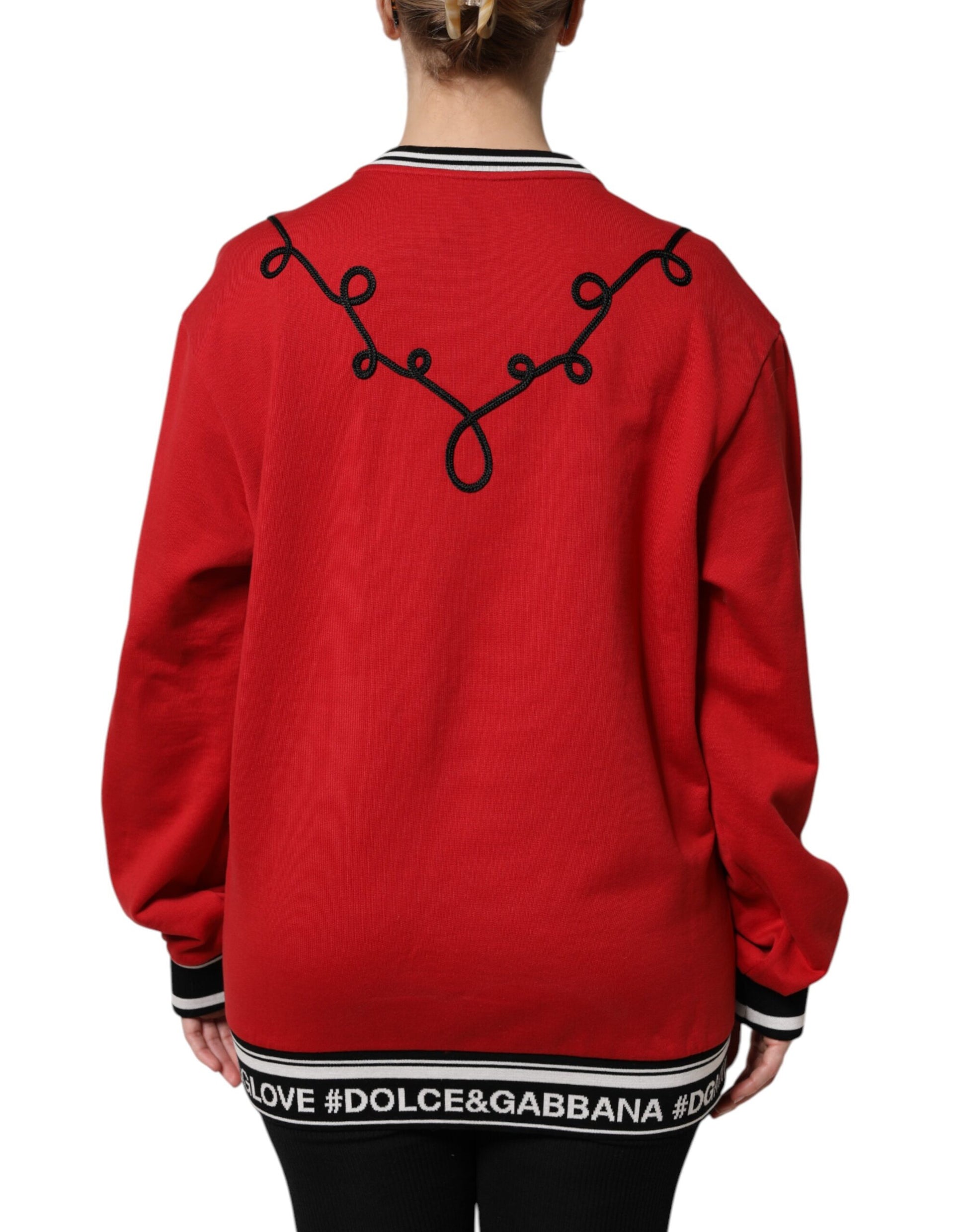 Red sweater with black embroidery on back