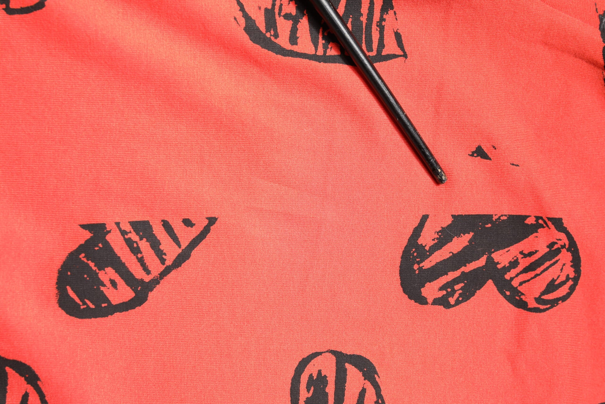 Red shirt with black print