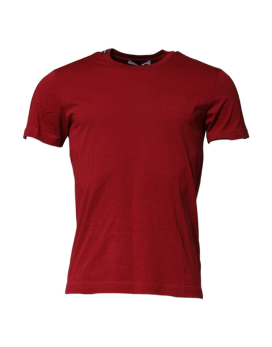Red short sleeved t-shirt on a hanger