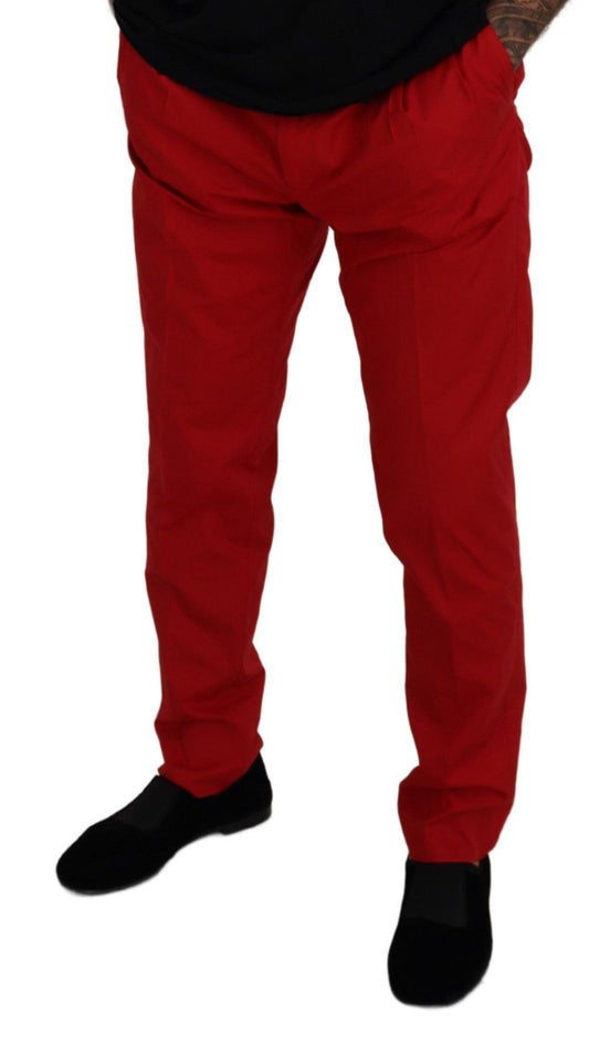 Man wearing red pants and black shoes