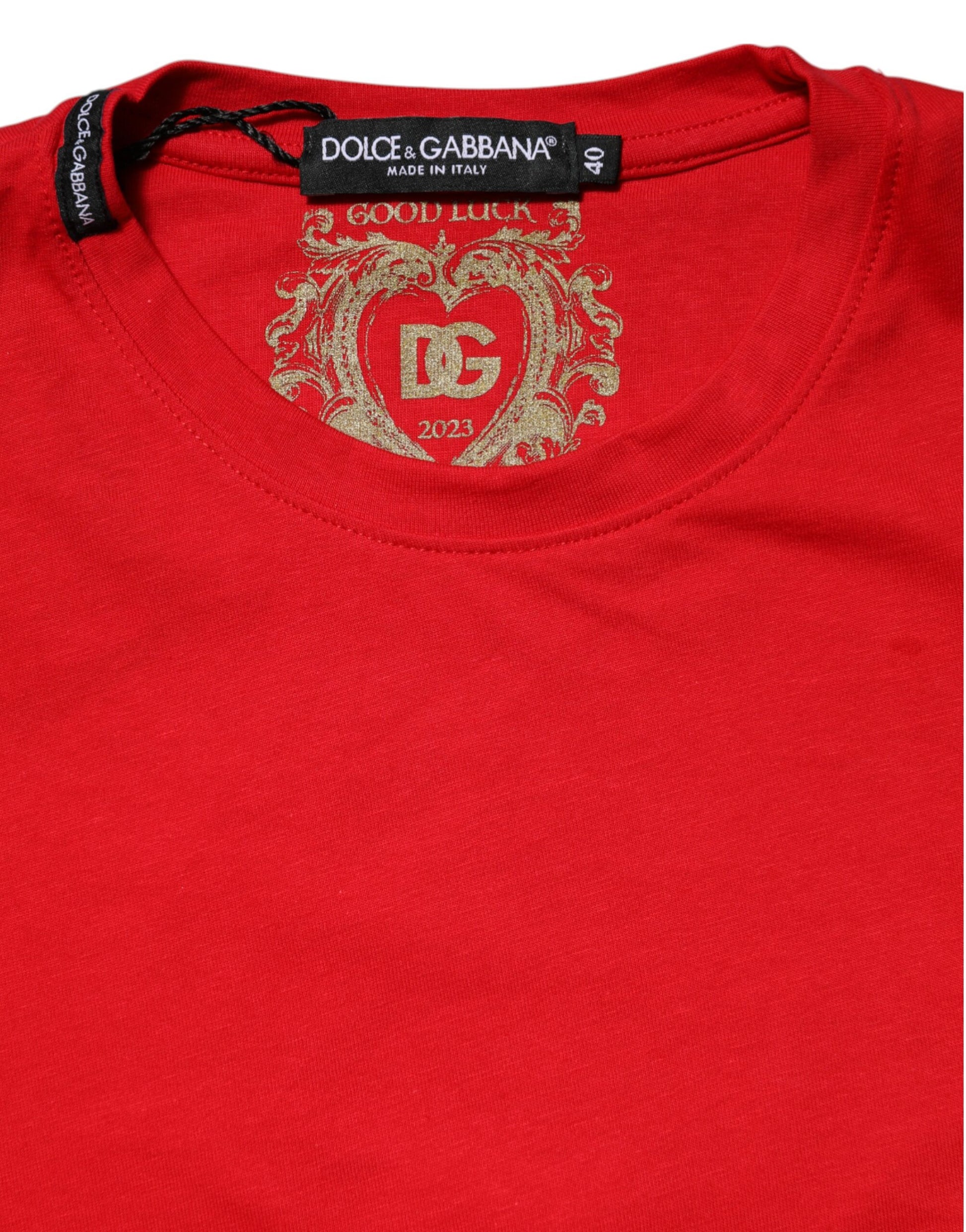 Red sweatshirt with gold embroidery on neckline