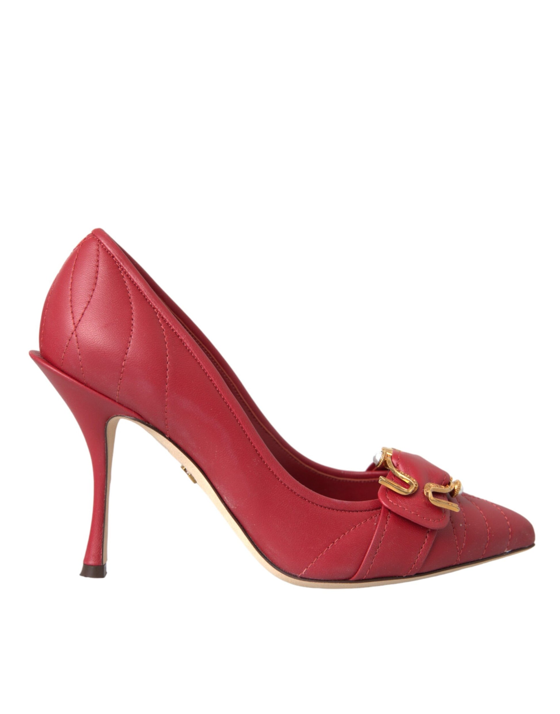 Red high heel shoe with gold buckle