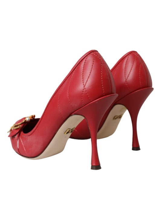 Red high heel shoes with pointed toe and red soles