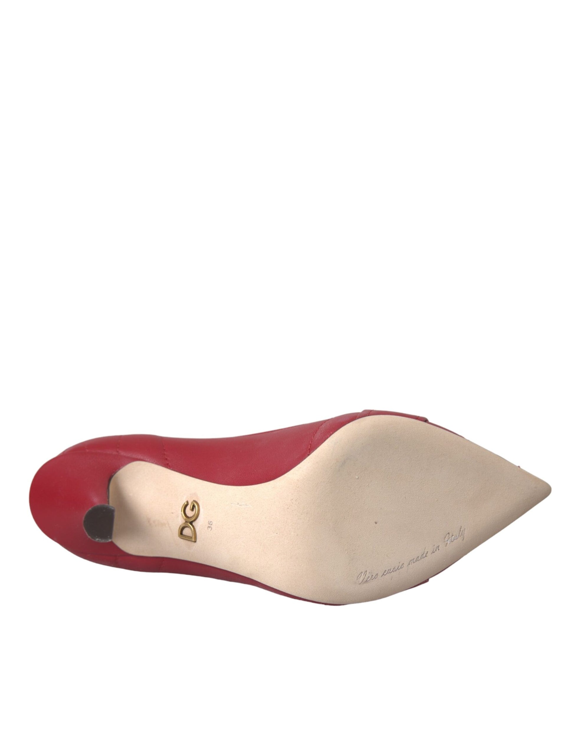 Red high heel shoe with tan inner lining