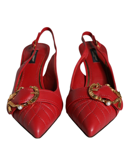 Red high heel shoes with gold accents