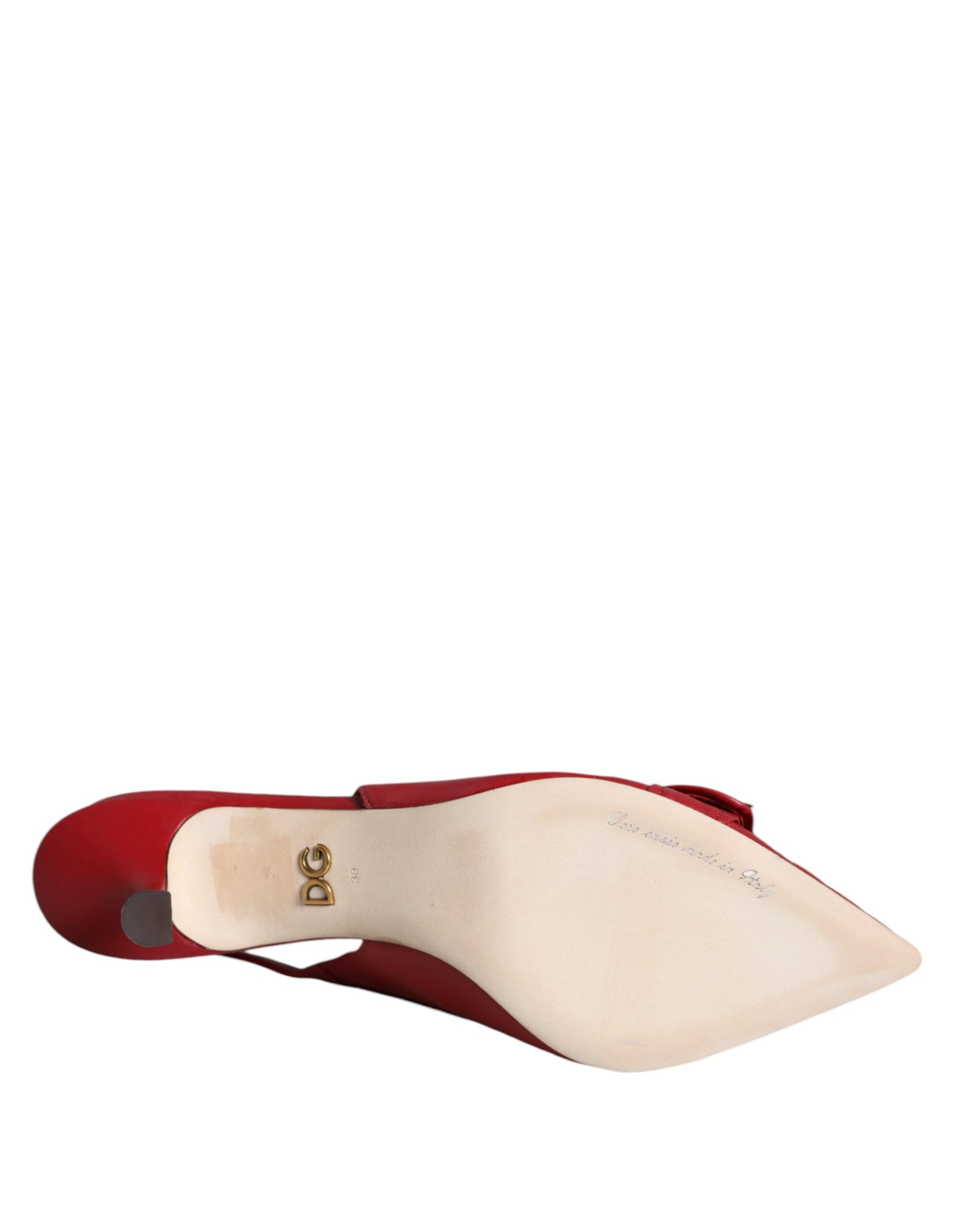 Red high heel shoe with tan toe cap