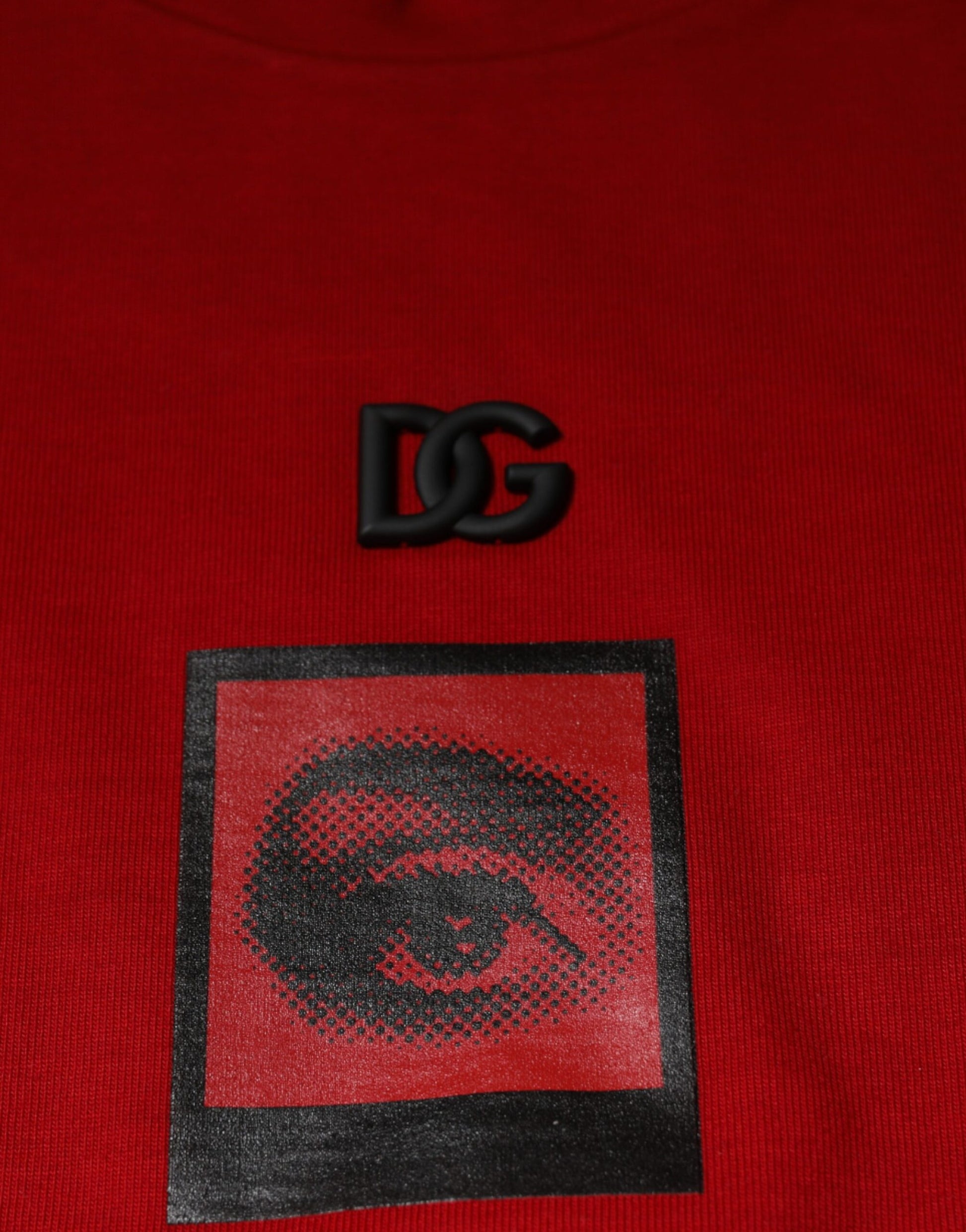 Red sweatshirt with black logo and red square design on front