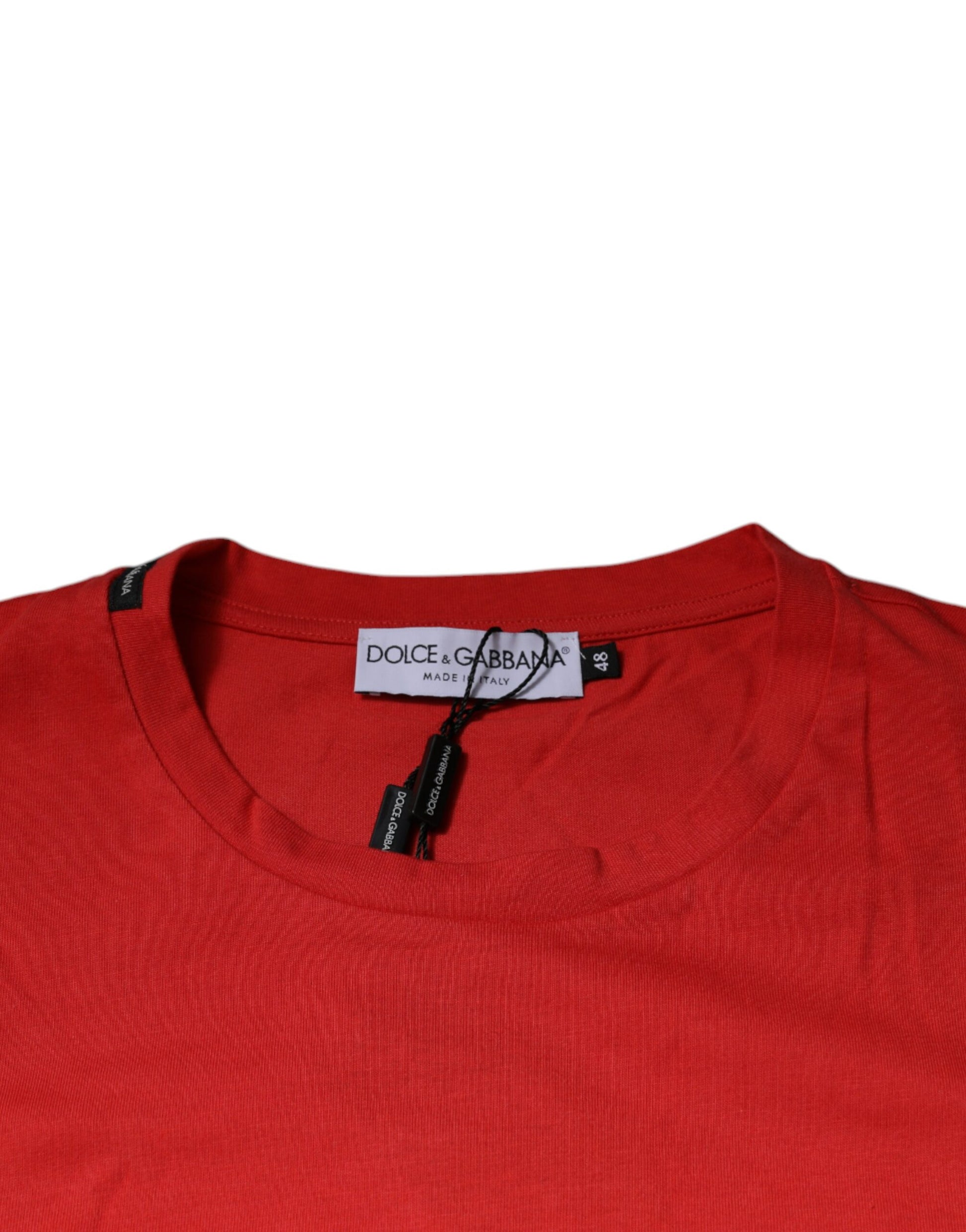 Red long sleeve shirt on hanger