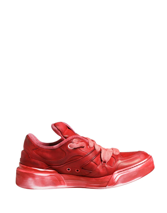 Red sneaker with white sole