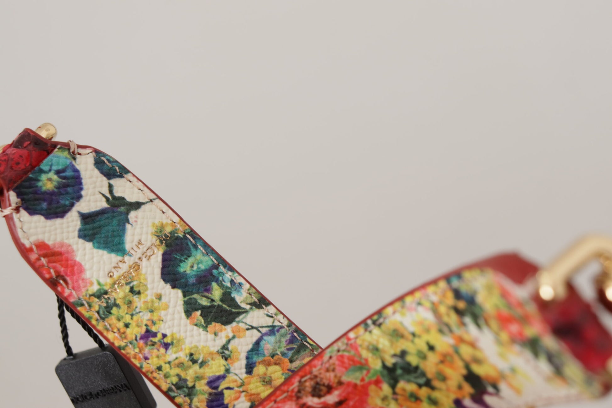 Floral patterned fabric belt with gold buckle