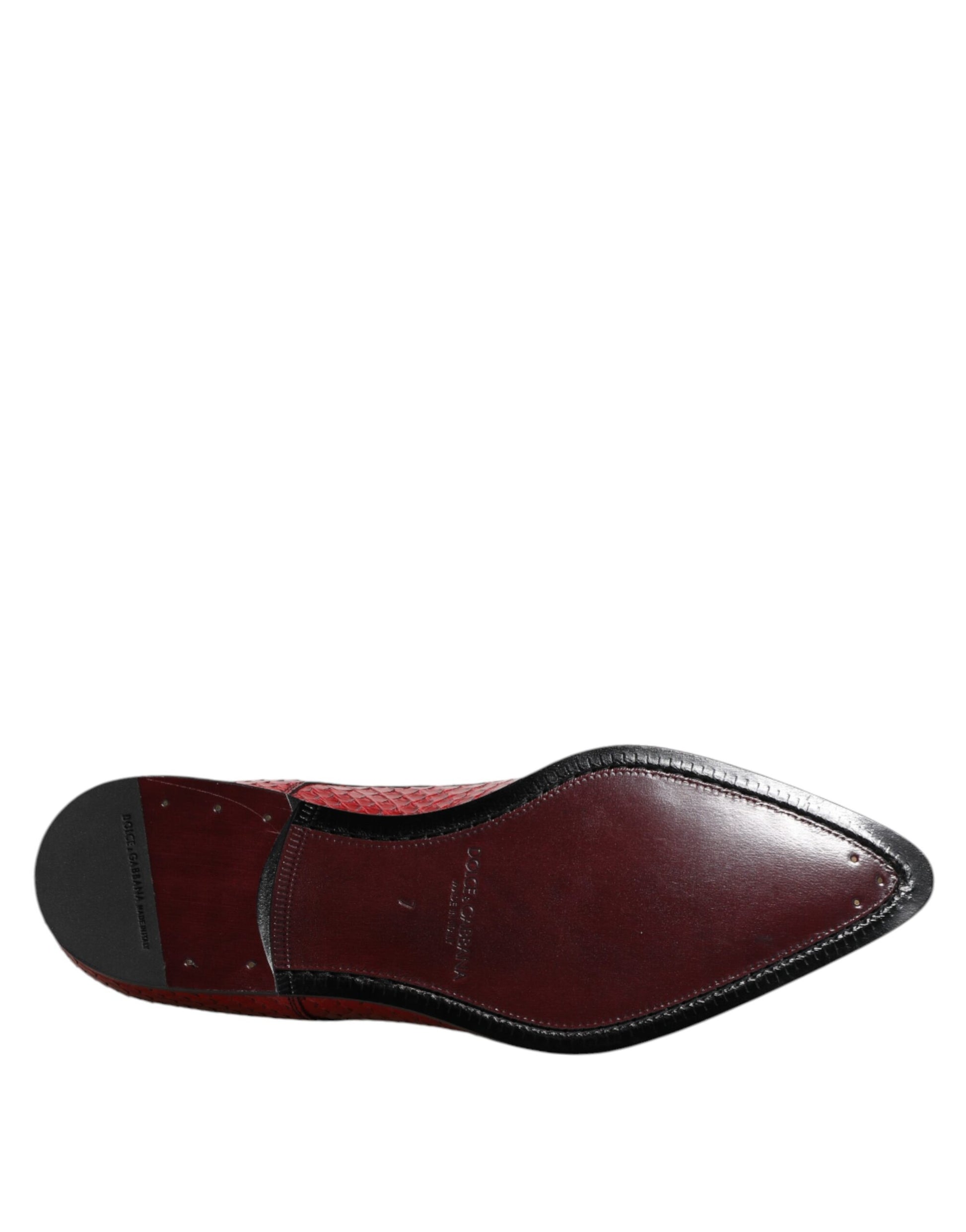 A single red lace-up dress shoe with exotic leather material and a black sole