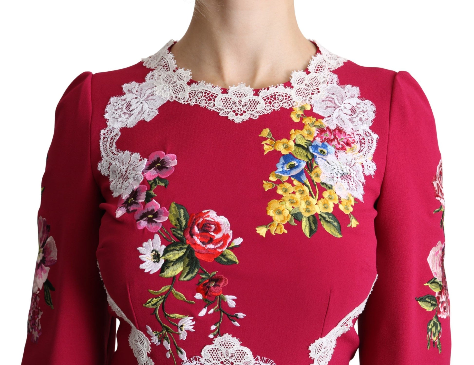 A red floral embroidered midi dress with lace detailing on the bodice