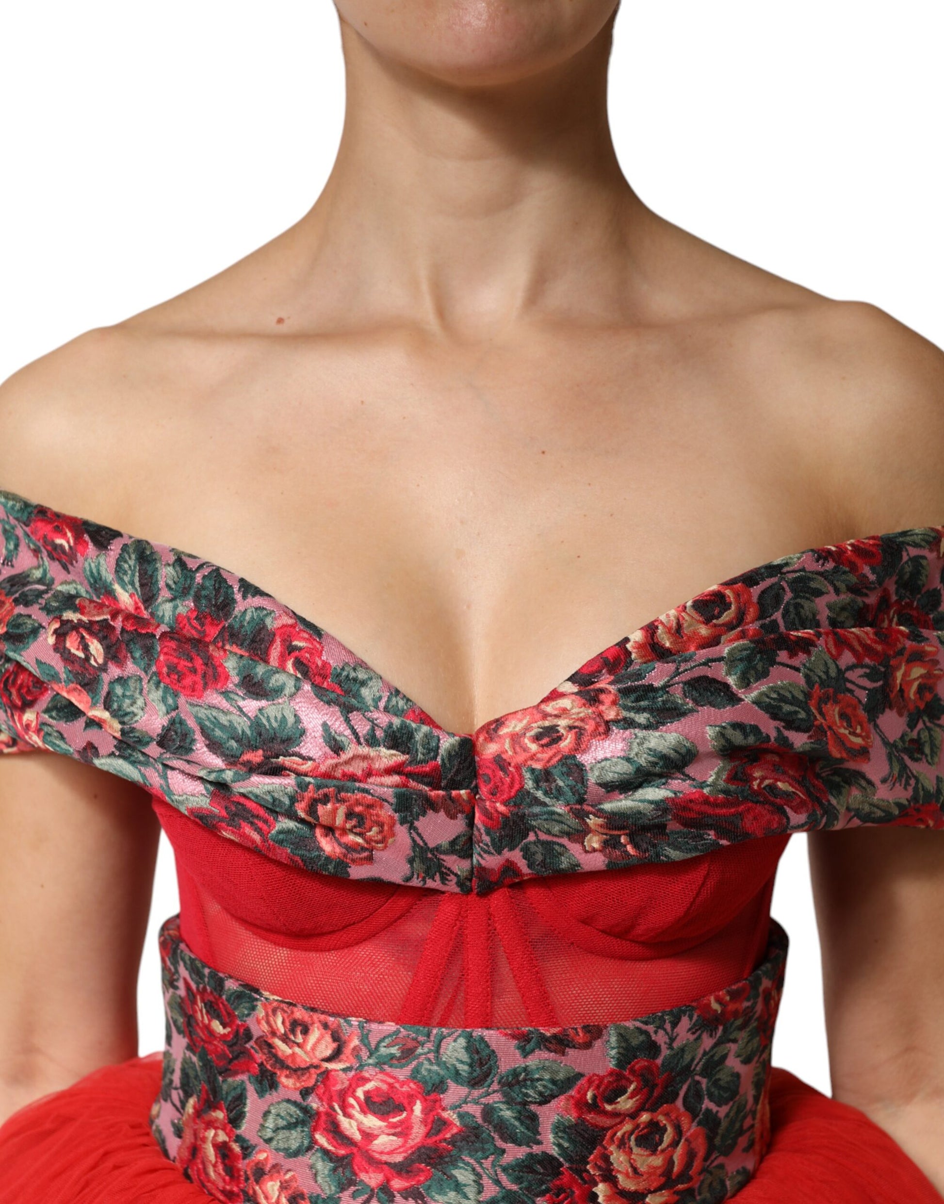 Woman wearing floral print dress with red straps