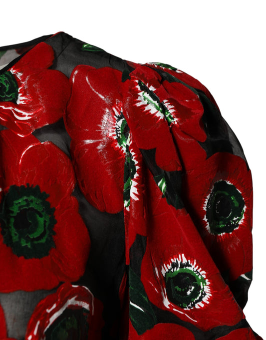 A nylon midi dress with red floral print and black trim