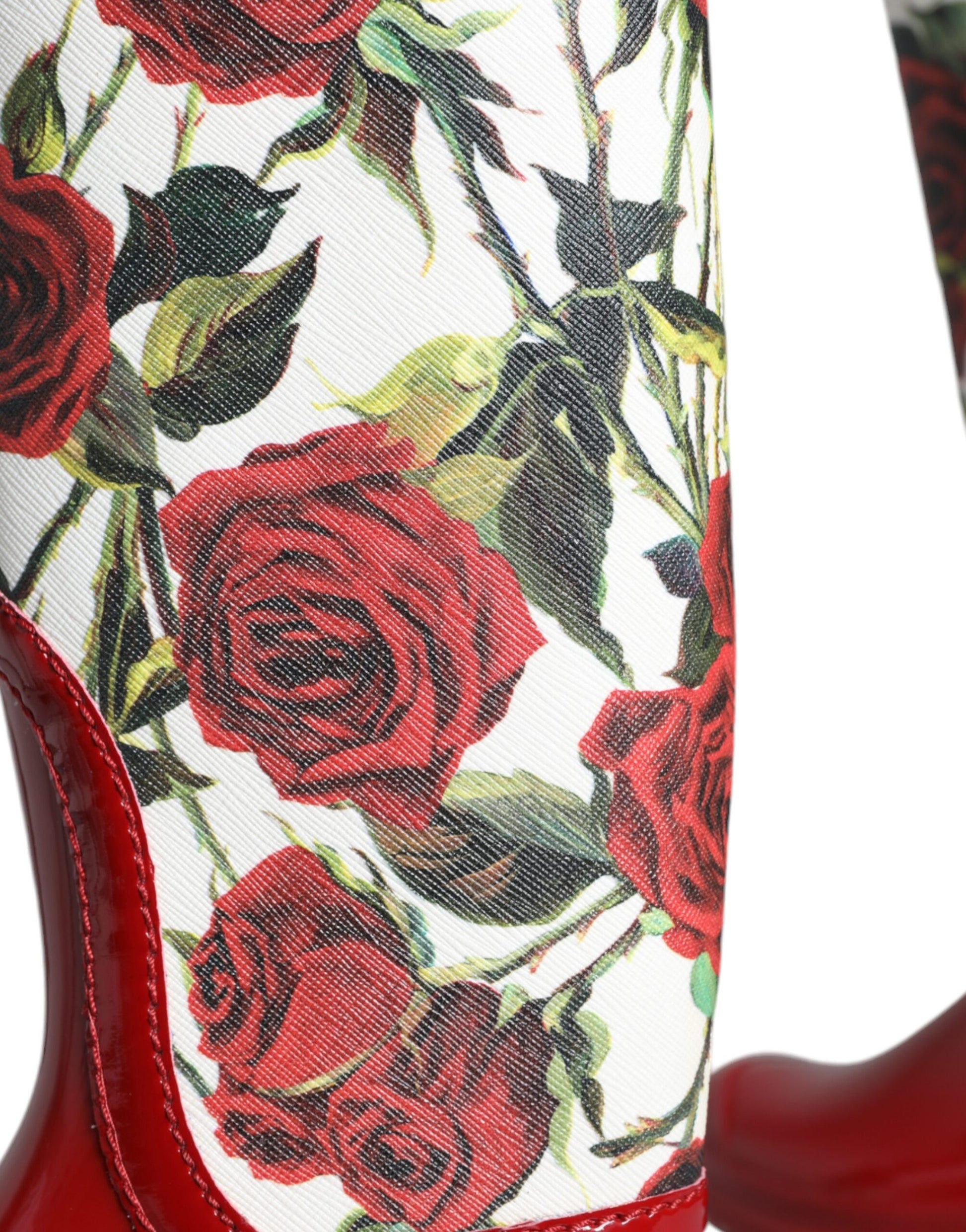 Floral print boot with red roses on a white background