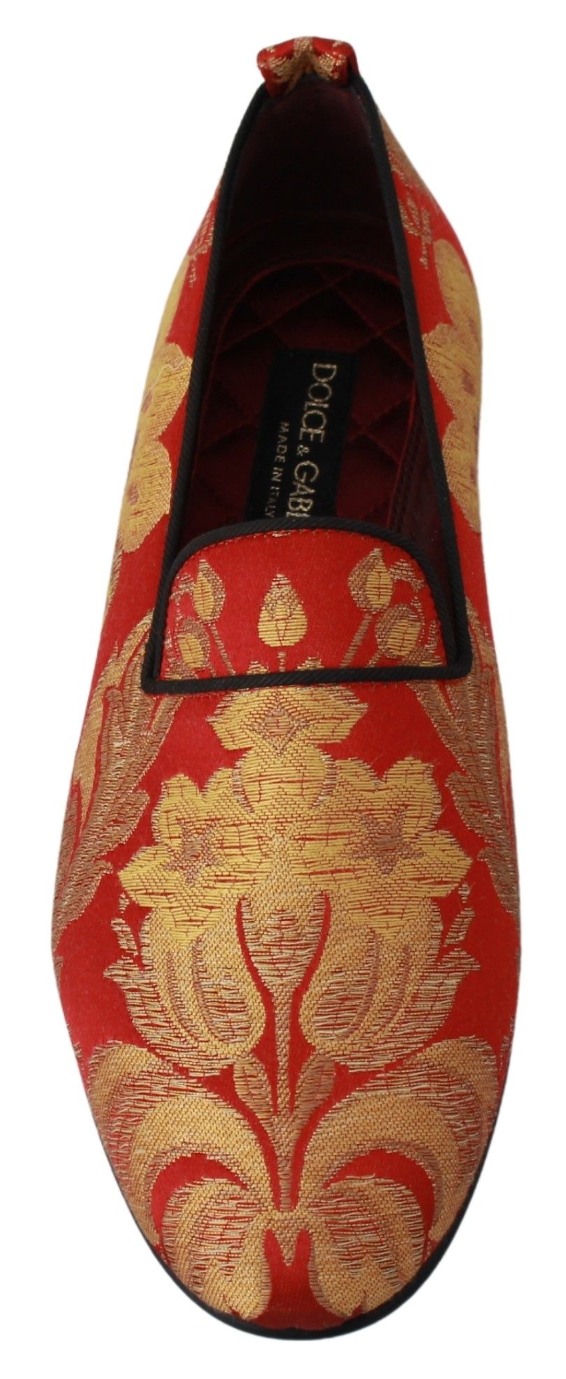 Red shoe with gold embroidery on top and heel