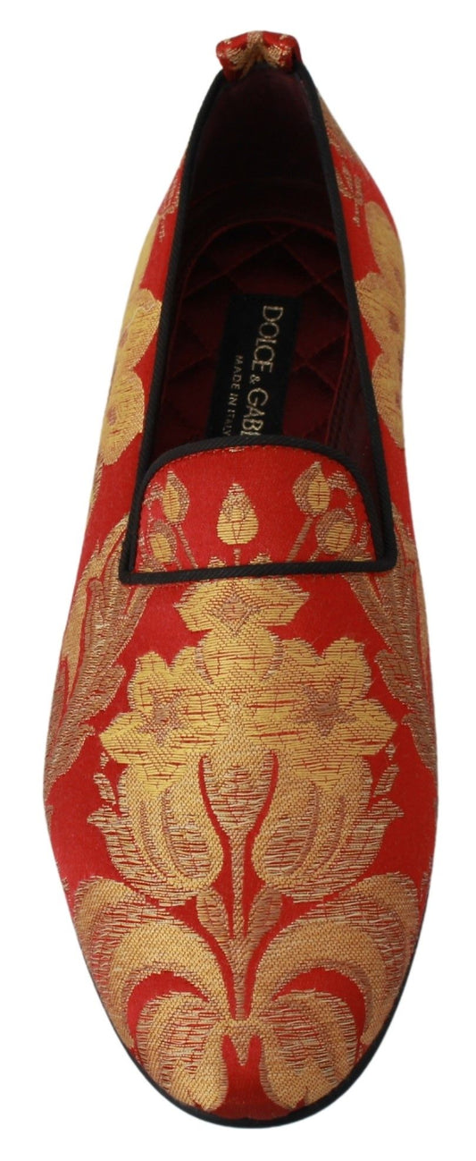 Red shoe with gold embroidery on top and heel