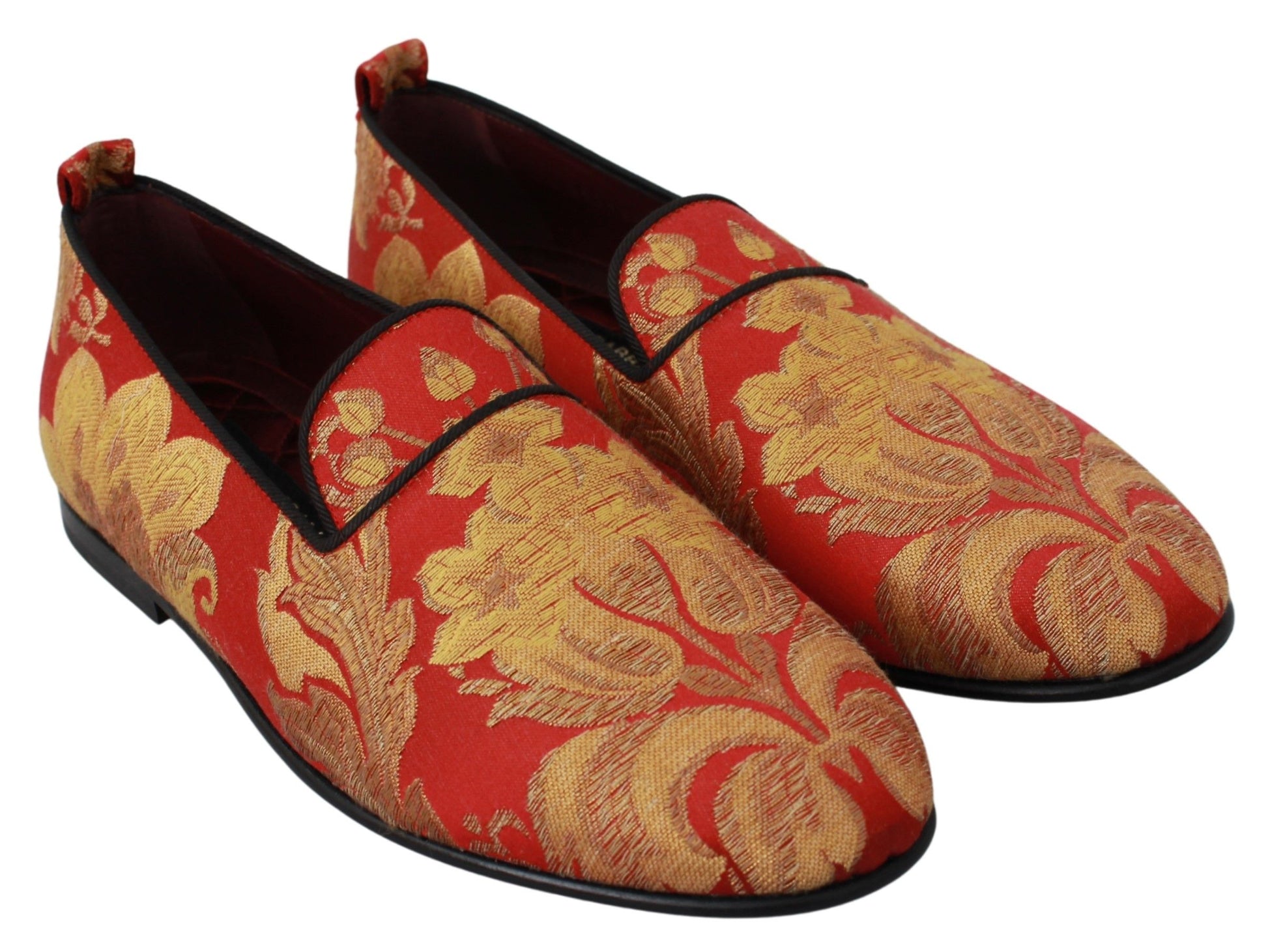 Pair of red and gold embroidered slippers with black soles